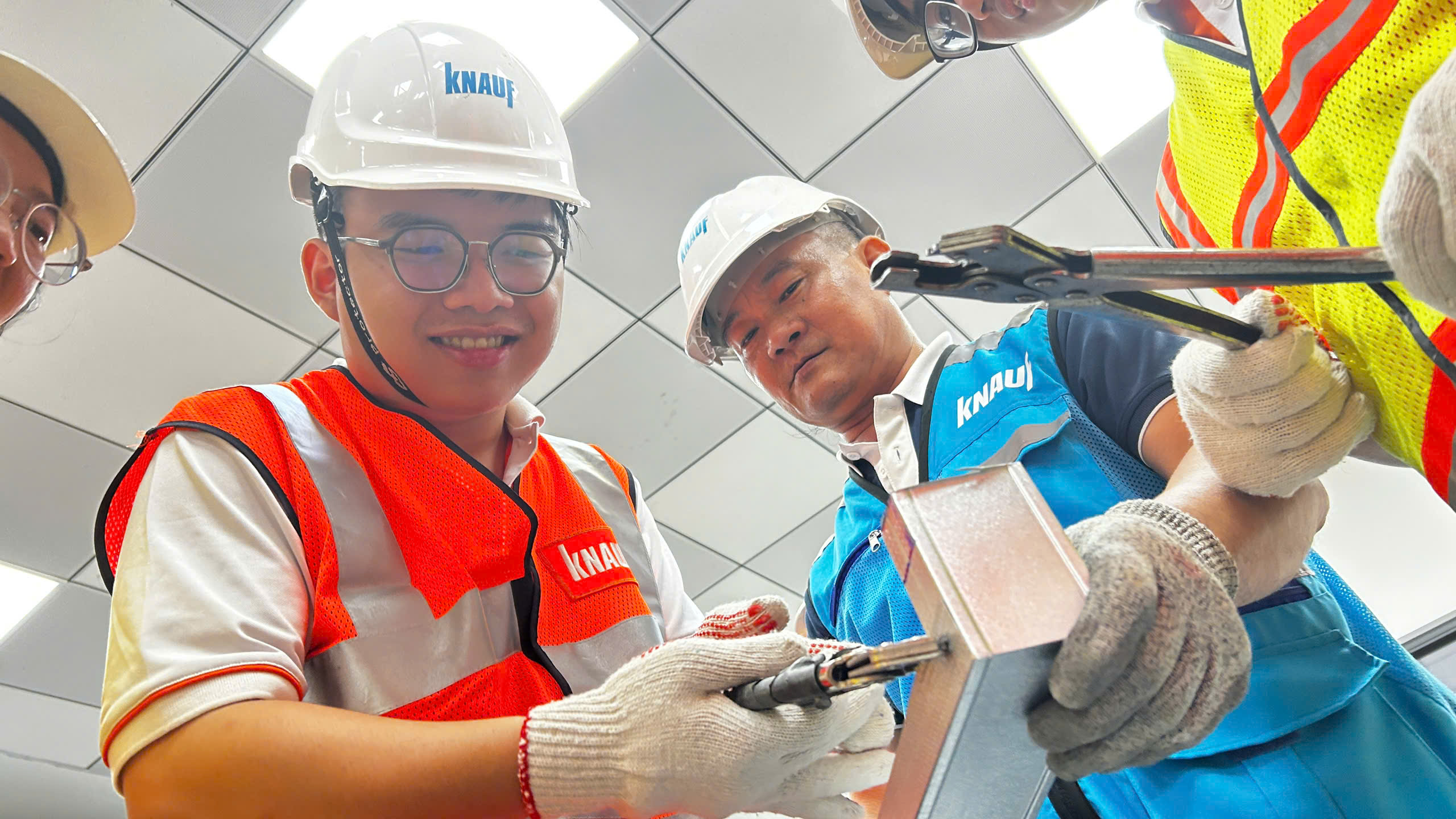 Instructors demonstrating jointing compound properties - Illustration 3